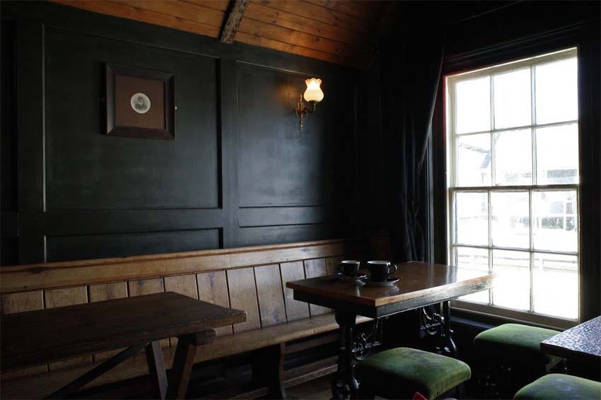 The interior of a cosy pub.