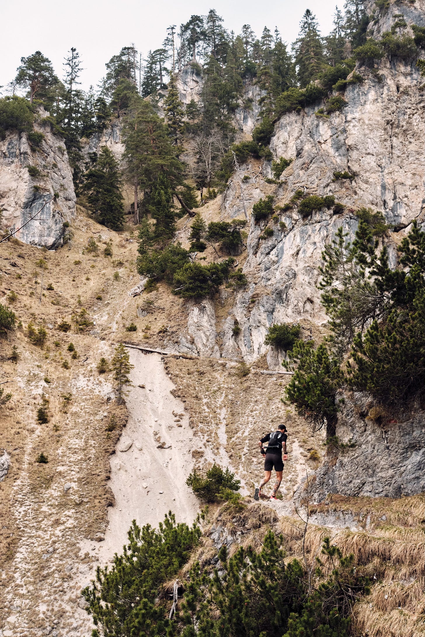 The author running over a narrow mountain path