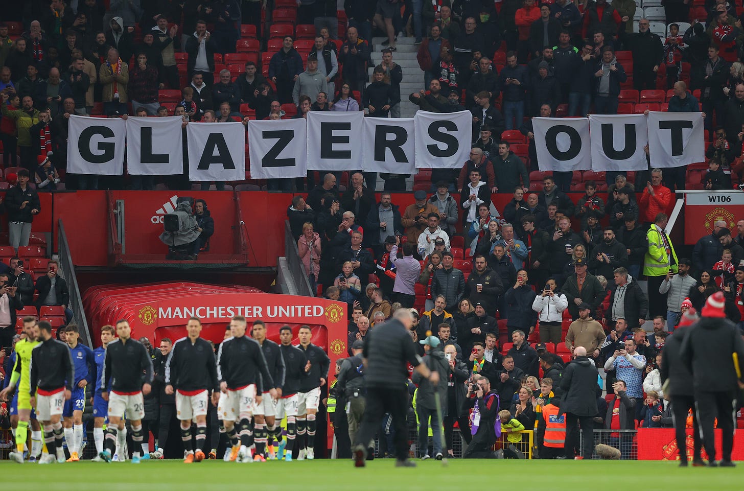 Man Utd fans hold 'Glazers out' banners with thousands of seats empty at  Old Trafford vs Chelsea as protests continue | The Sun