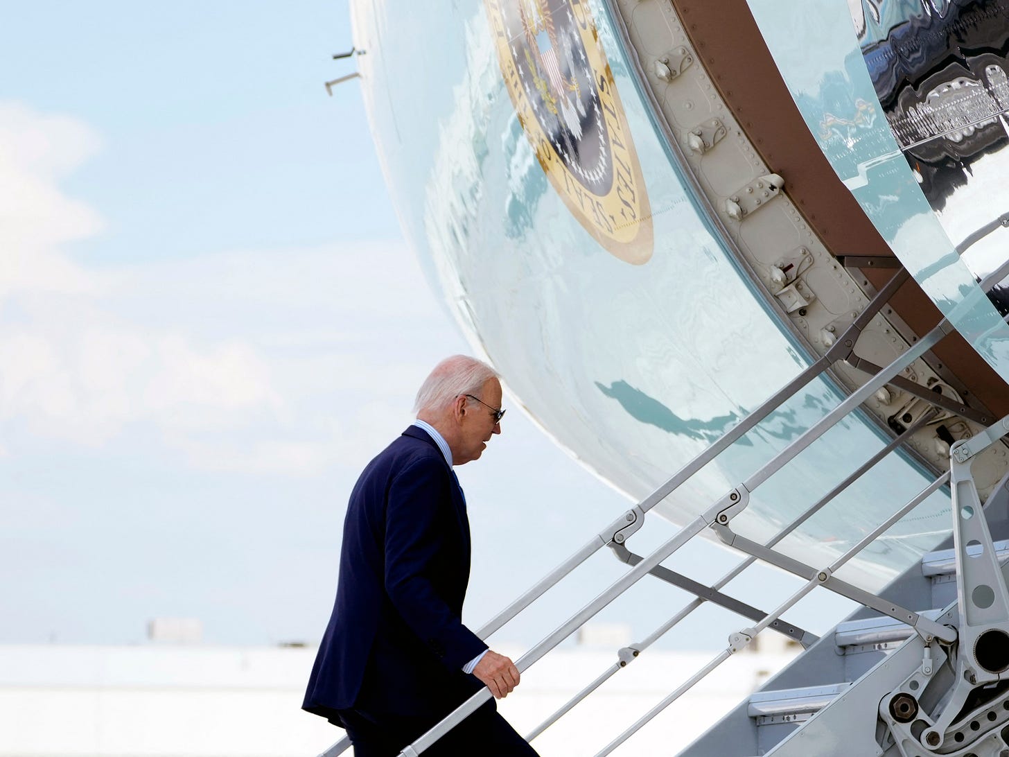 President Biden boards Air Force One as he departs Harry Reid International Airport in Las Vegas, Nevada, on July 17, 2024, en route to Delaware, after testing positive for COVID.