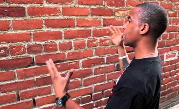 r/antimeme - a person standing in front of a brick wall