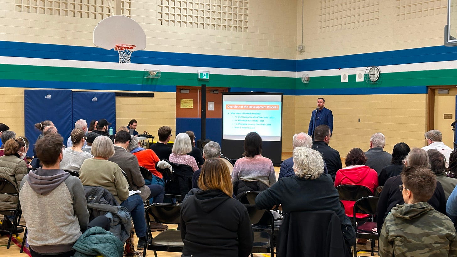 Councillor Cameron Kroetsch speaking to residents on March 26, 2024 about the development process and the new Ward 2 Development Map