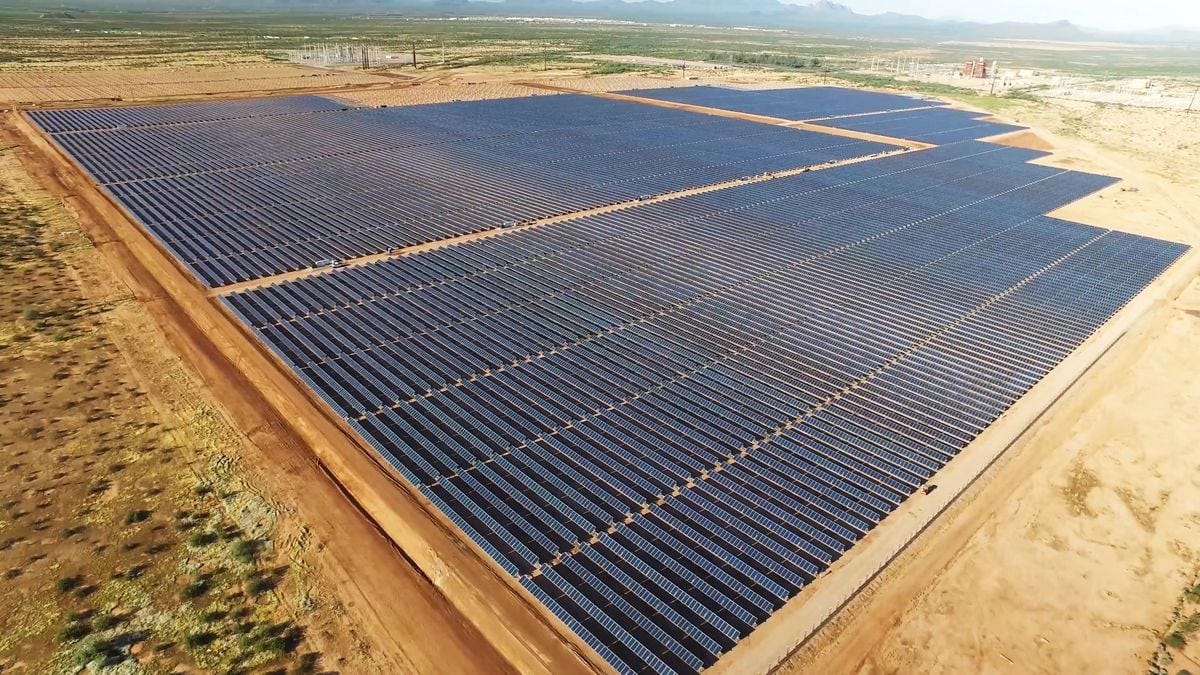 A field of solar panels in the California desert.