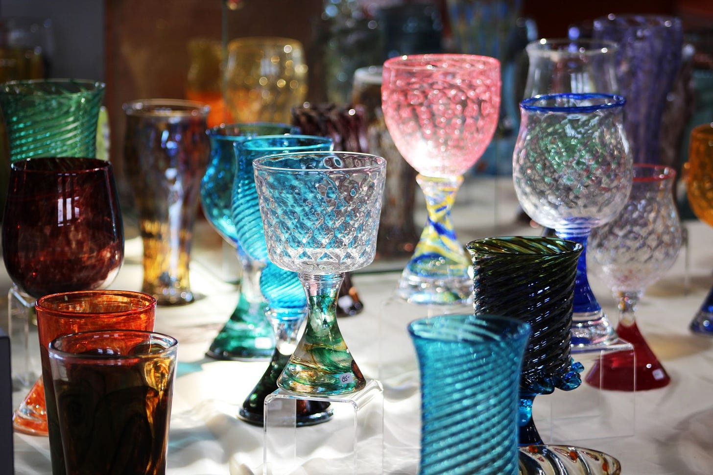 Image of blown glass goblets via Tash Guimond of Unsplash