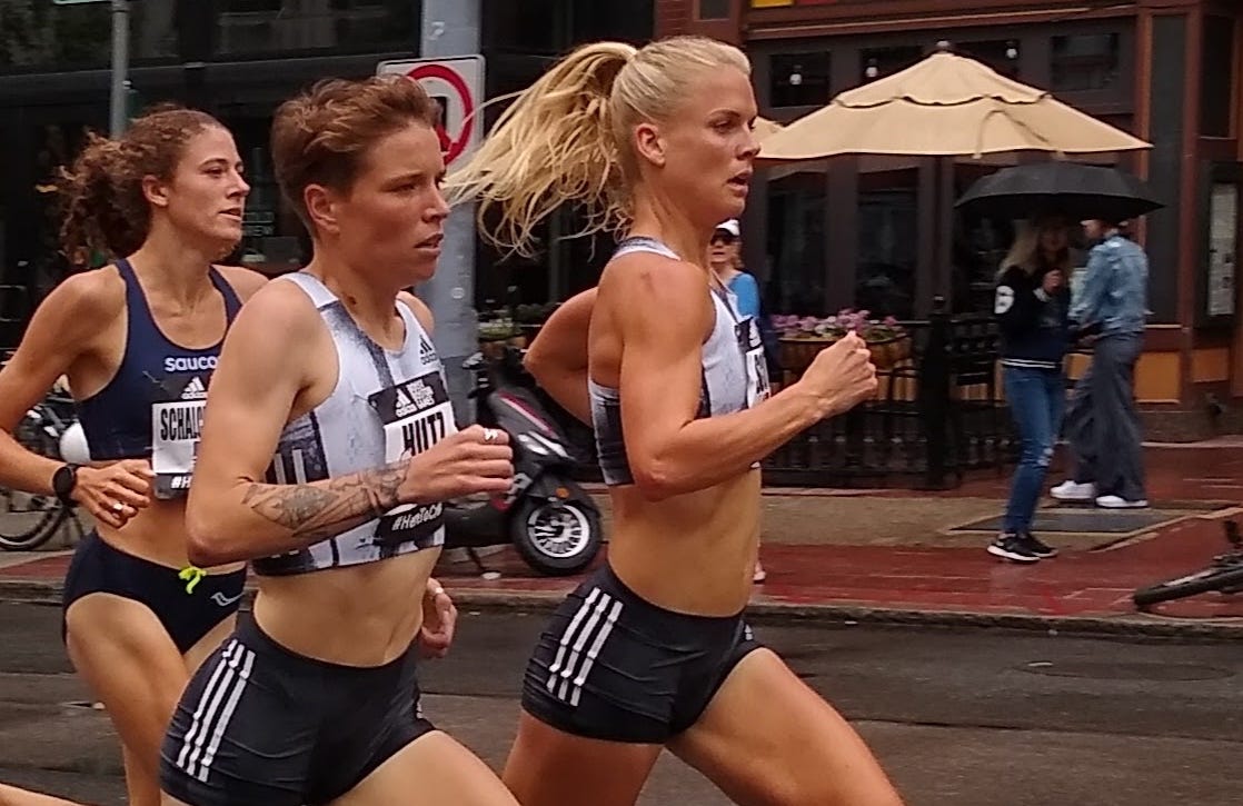 Nikki Hiltz (middle) and Dominique Scott (right) running the Back Bay Mile at the Adidas Boost Boston Games in 2019.