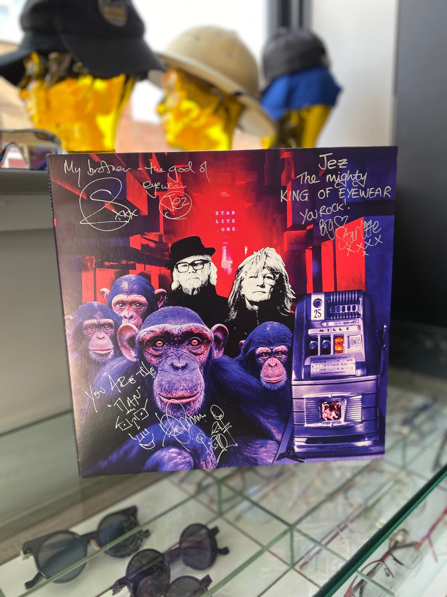 Vinyl album cover of STARLITE.ONE featuring chimpanzees and Simon Campbell and Suzy Starlite on the album artwork - by Starlite & Campbell
