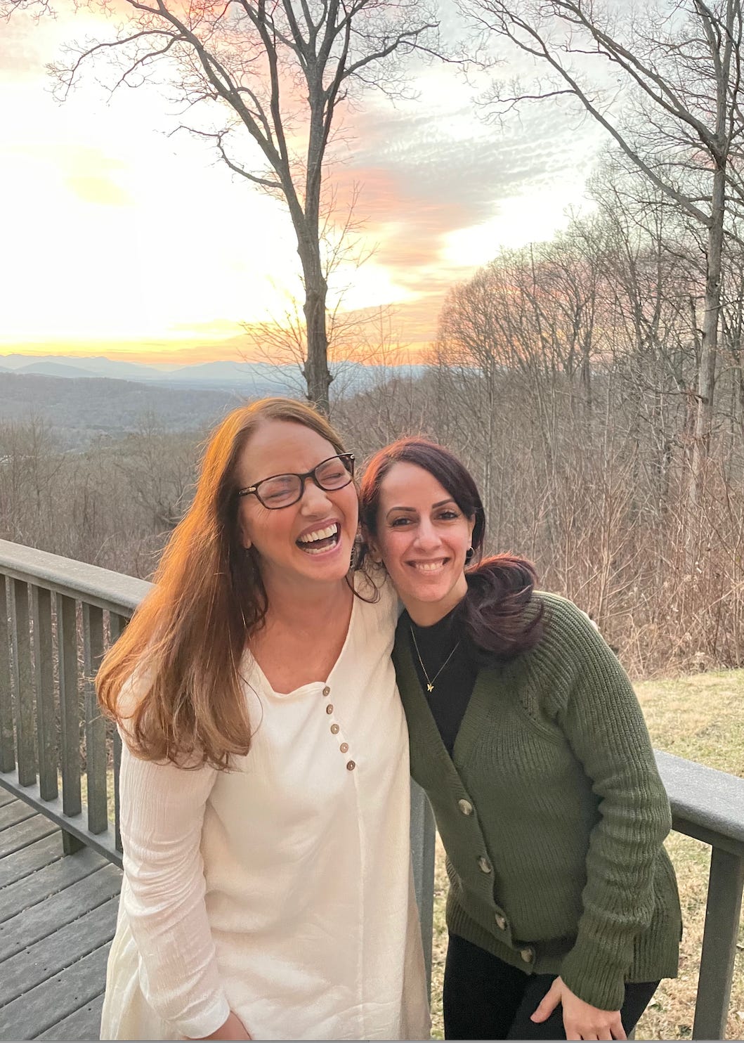 Image ID: Fihmiya is on the left at a retreat in North Carolina photographed with another woman in a white sweater outdoors.