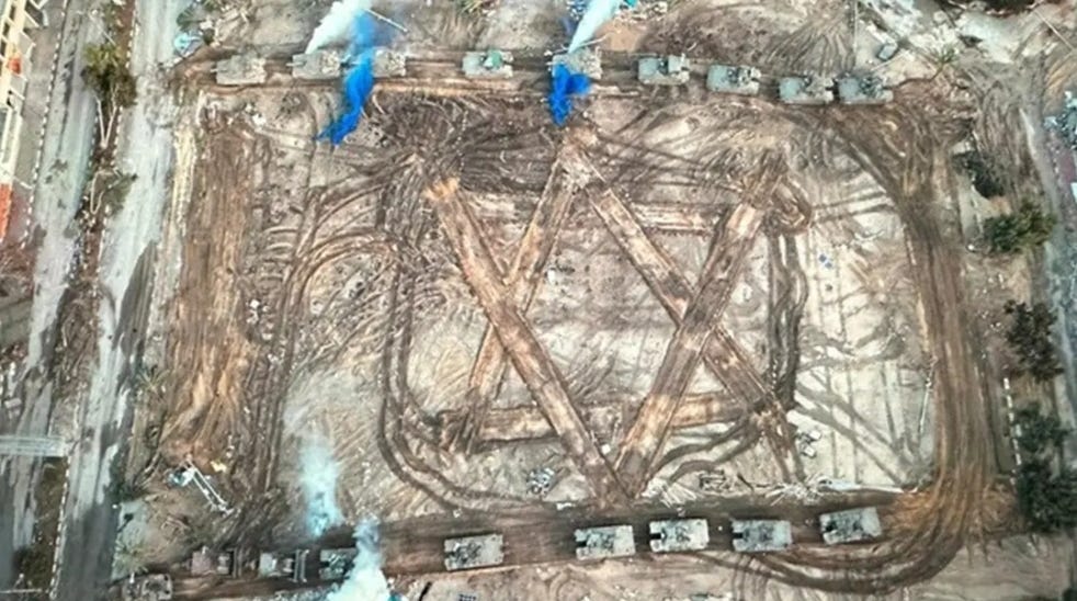 Israeli tanks engrave a giant Star of David on the spot where the 10/7/23 attack took place.