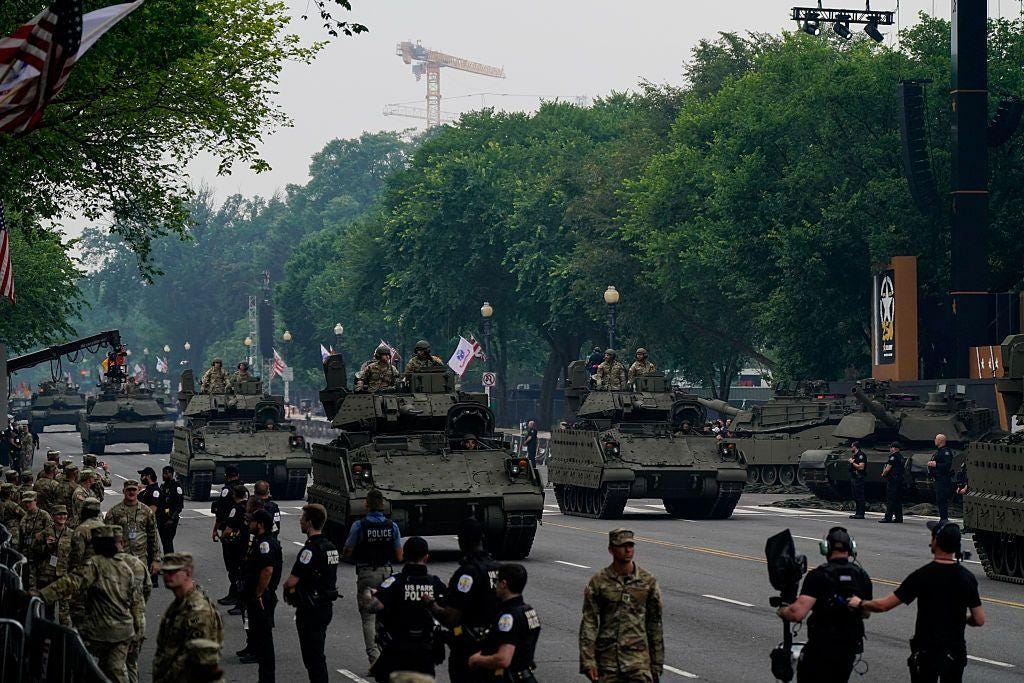 Trump addresses huge military parade as protesters rally across US against  his presidency - BBC News
