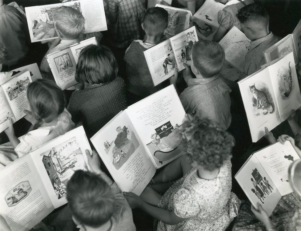 Children reading c.1960 'Celebrating World Book Day'