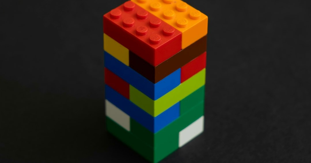 a cube with a red and blue design on it a cube with a red and blue design on it