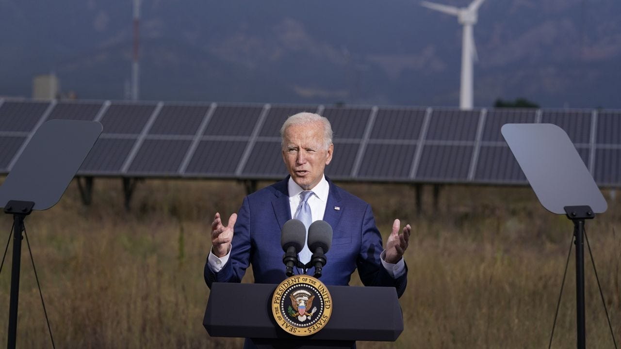 Biden highlights climate change in push for spending bill