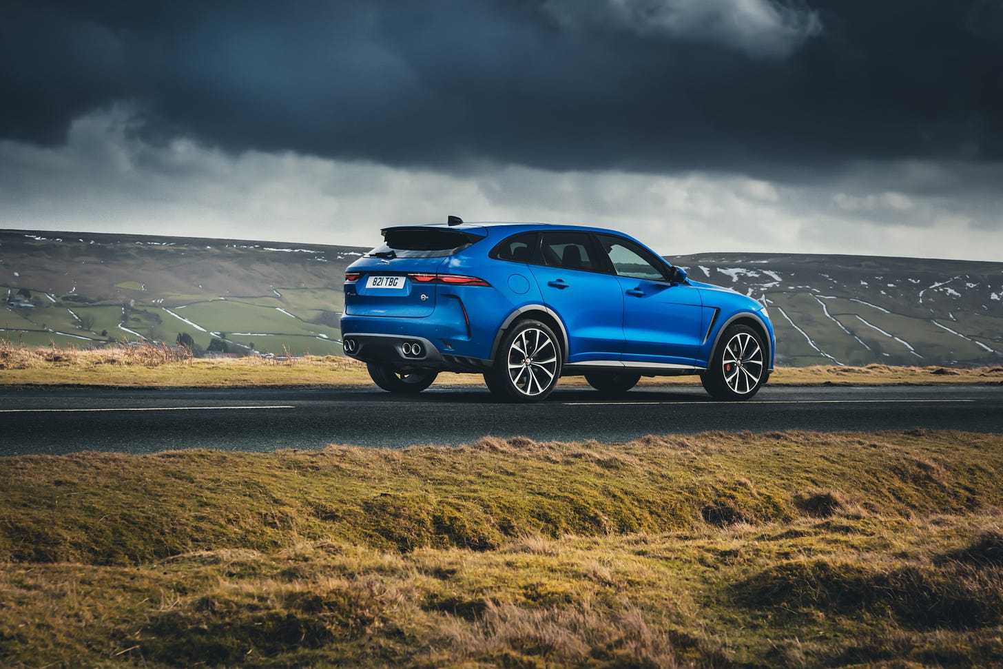 Rear 3/4 view of Jaguar F-Pace SVR in Velocity Blue