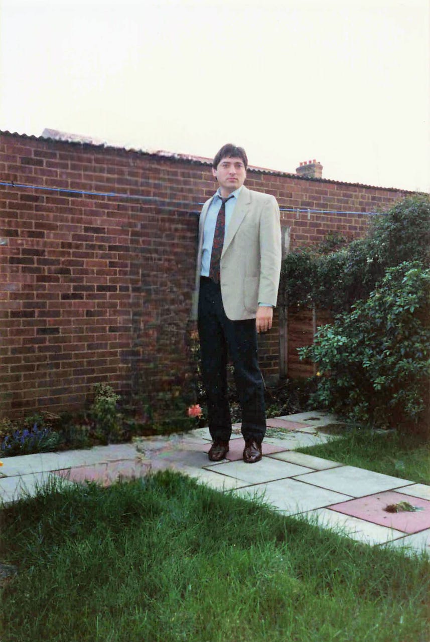 Photo of Terry in jacket and tie