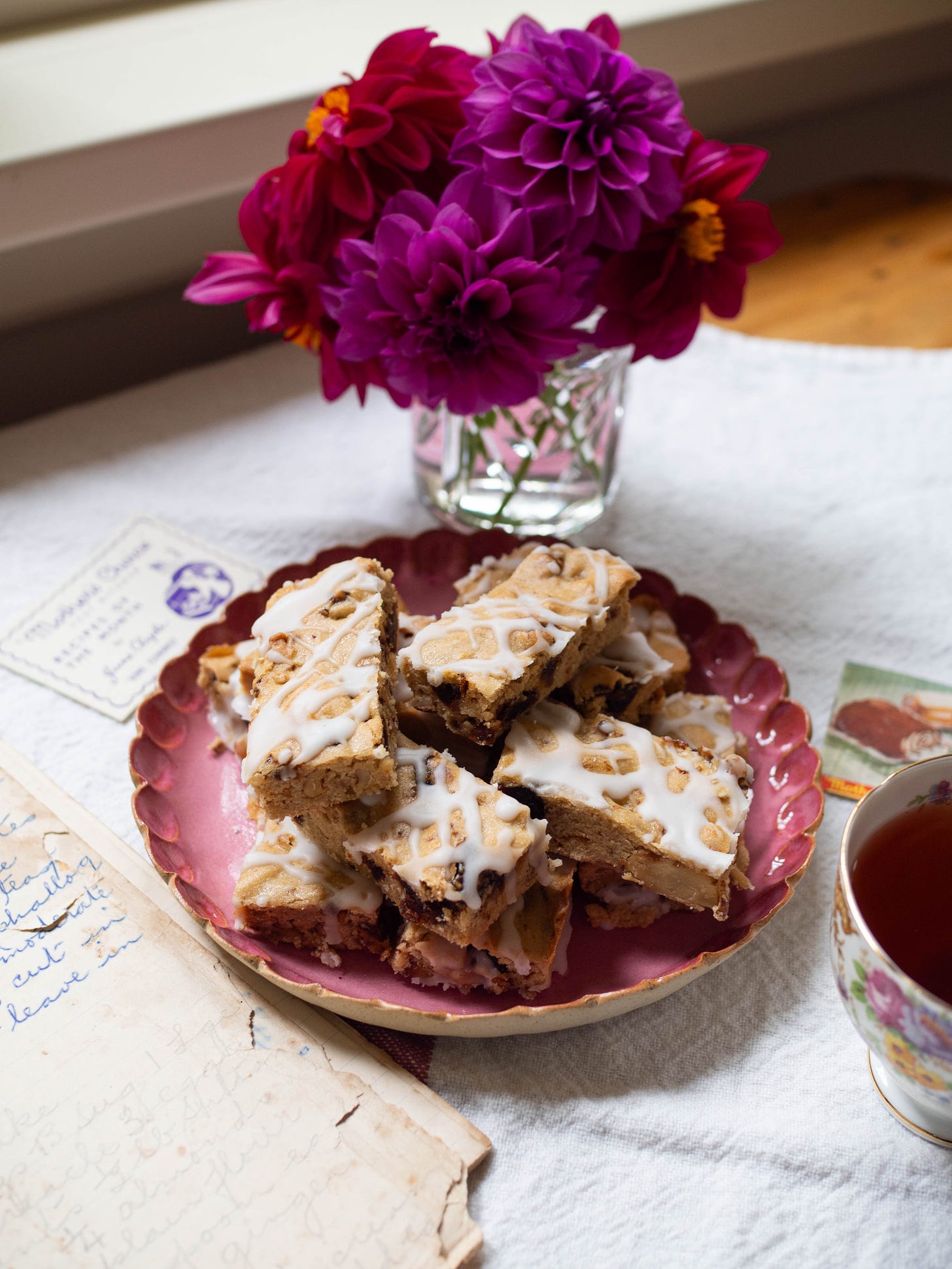 Caramel Fingers on Pink Plate with Dahlias in Background