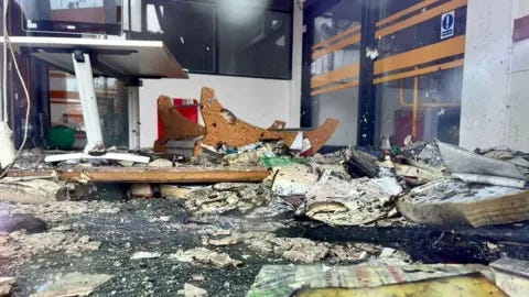 BBC The destroyed interior of the Spellow Hub community library