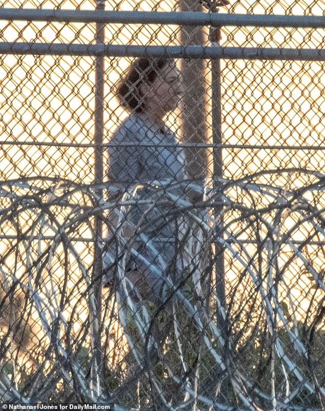 Maxwell is currently serving a 20-year sentence at FCI Tallahassee, with a release date of 2037; pictured on walking on the prison yard in 2022