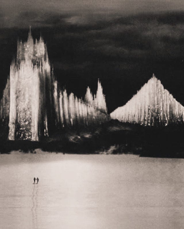 Two figures approach The Cathedral of Ice in Arnold Fanck's 1926 silent film The Holy Mountain (" Der heilige Berg").