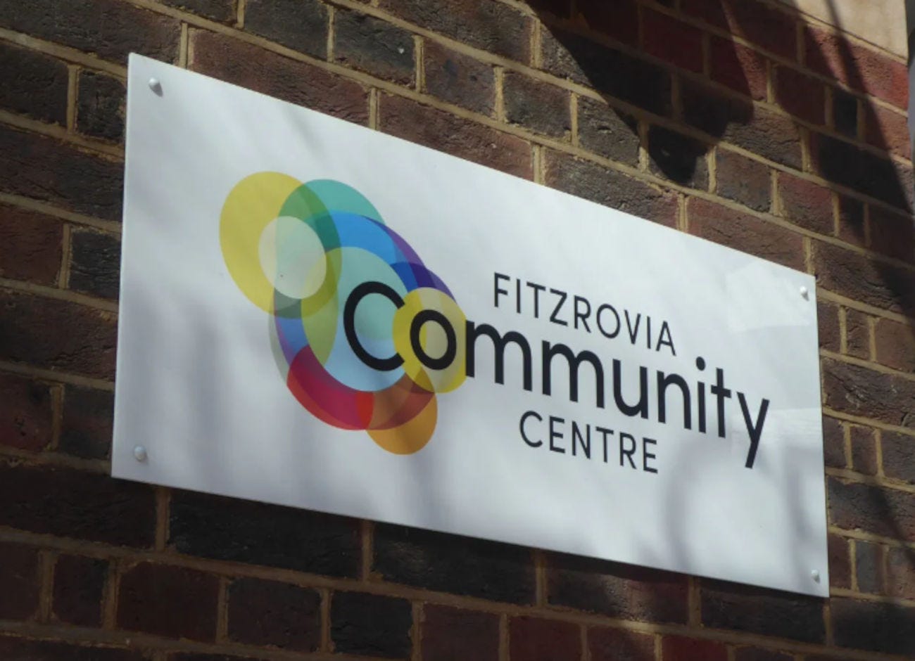 Sign on wall says Fitzrovia Community Centre.