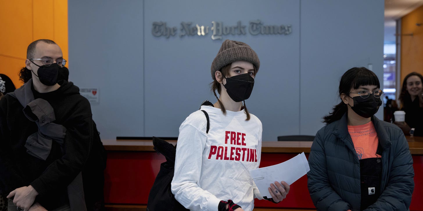 NEW YORK, NEW YORK - MARCH 14: Pro-Palestine protesters flood the lobby of the New York Times offices and block the security entrances during an action criticizing the newspaper's coverage of the Israel-Hamas war on March 14, 2024 in New York City. The protest lasted nearly two hours and resulted in approximately 100 arrests. (Photo by Michael Nigro/Sipa USA)(Sipa via AP Images)