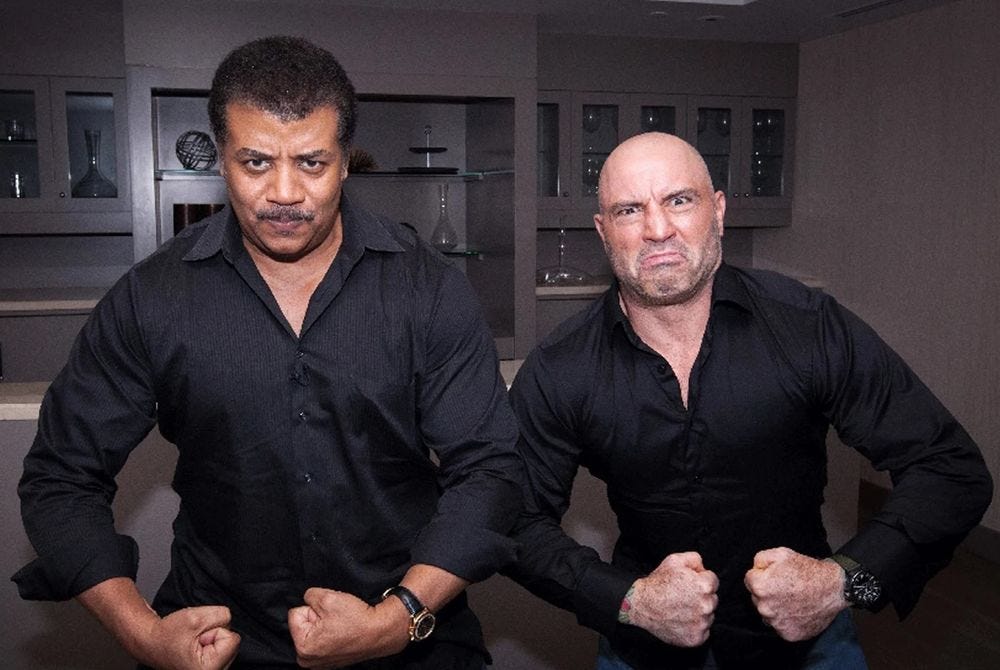 space science man neil deGrasse tyson flexing with cold plunge guy space science man neil deGrasse tyson flexing with cold plunge guy
