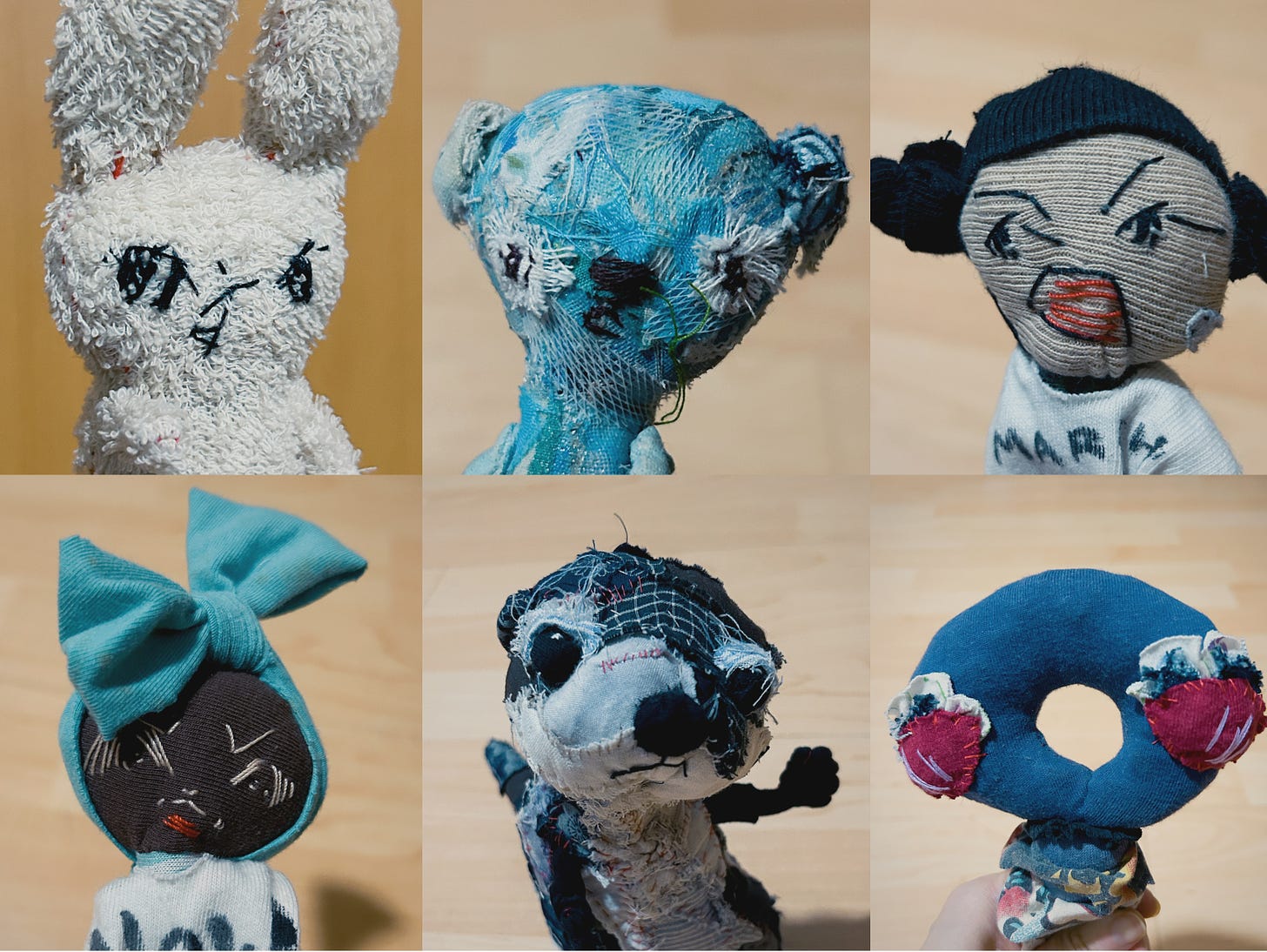 Noisybeak soft sculptures of a rabbit a bear, an otter, outer space creature, and 2 humans.