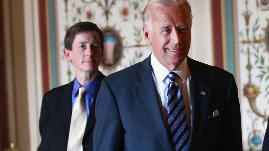 U.S. Vice President Joseph Biden (C) arrives for a meeting with a bicameral and bipartisan group of legislators with his Chief of Staff Bruce Reed (L) June 22, 2011 on Capitol Hill in Washington, DC.