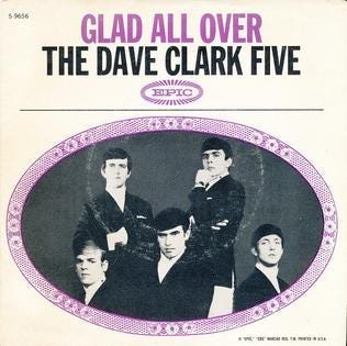 Cover of Dave Clark Five’s Glad All Over single features the band in a formal black & white portrait
