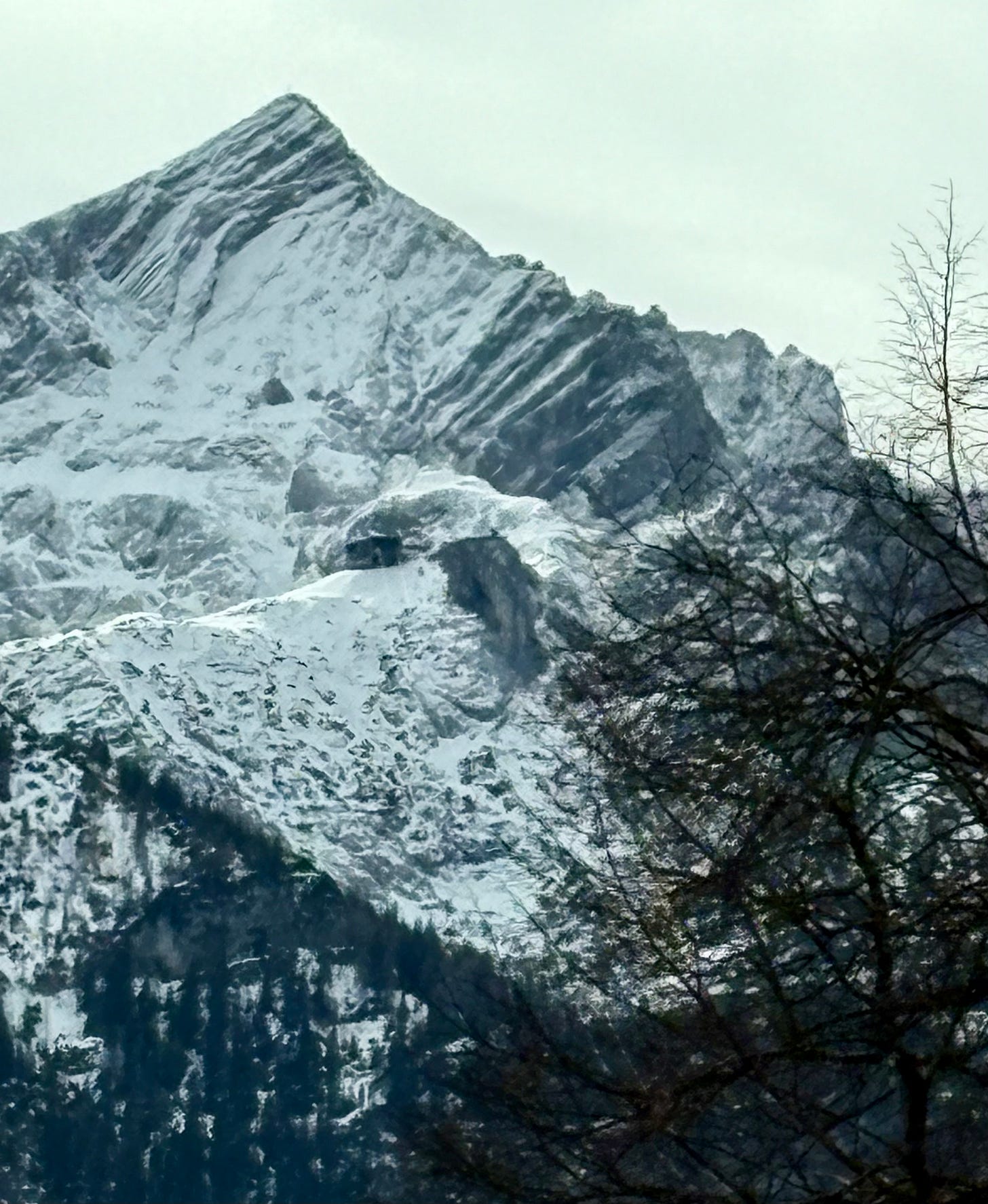 The Alpspitze mountain top and Osterfelderkopf covered in snow