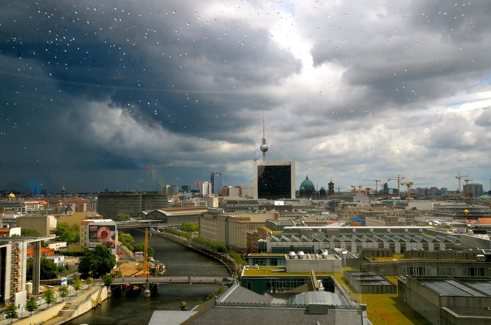 As sen through the glass with the droplets of rain on it, Berlin looked ethereal