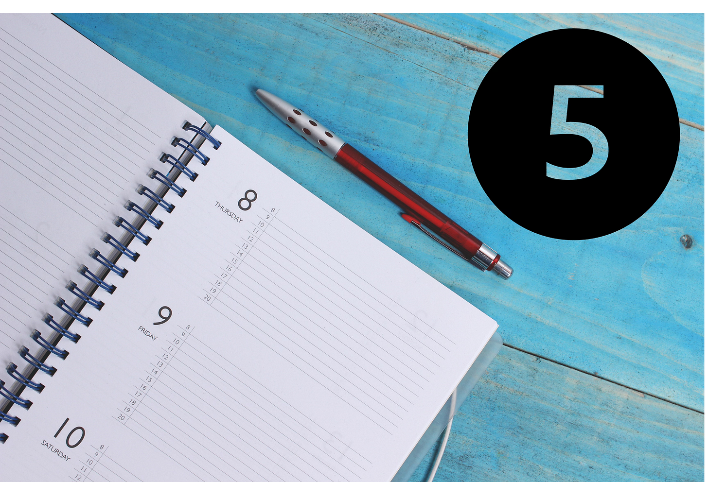 decorative image of white notebook on a blue table with a pen next to it. a large number 5 in the top right corner
