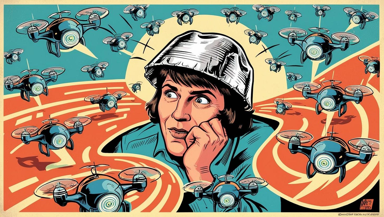 Man with tin foil hat circled by drones