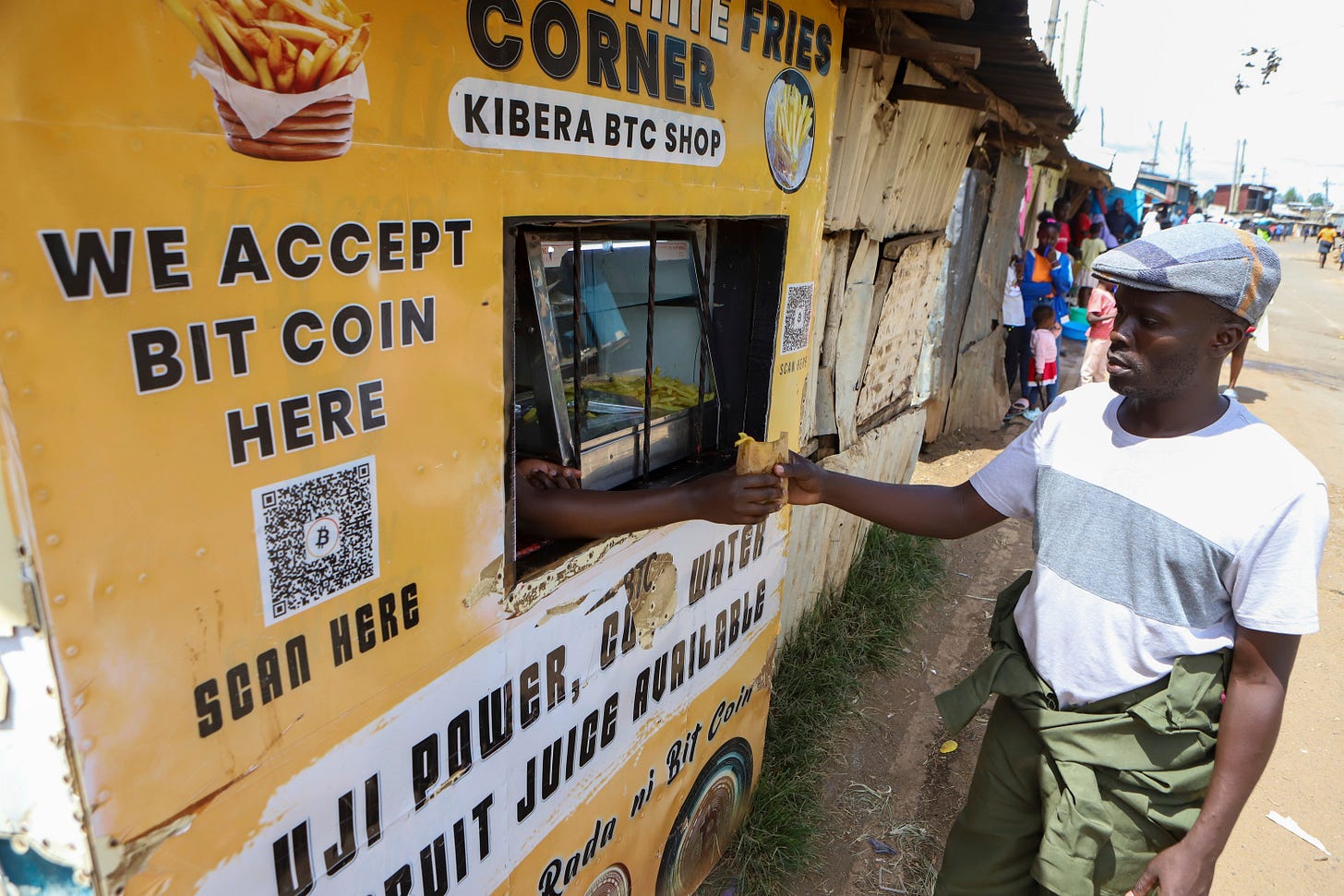 <p>Kevin Gundo buys chips at a shop that accepts bitcoin payments at Kibera Slums in Nairobi, Kenya, Sunday, May 4, 2025. (AP Photo/Andrew Kasuku)</p> <p>Kevin Gundo buys chips at a shop that accepts bitcoin payments at Kibera Slums in Nairobi, Kenya, Sunday, May 4, 2025. (AP Photo/Andrew Kasuku)</p>