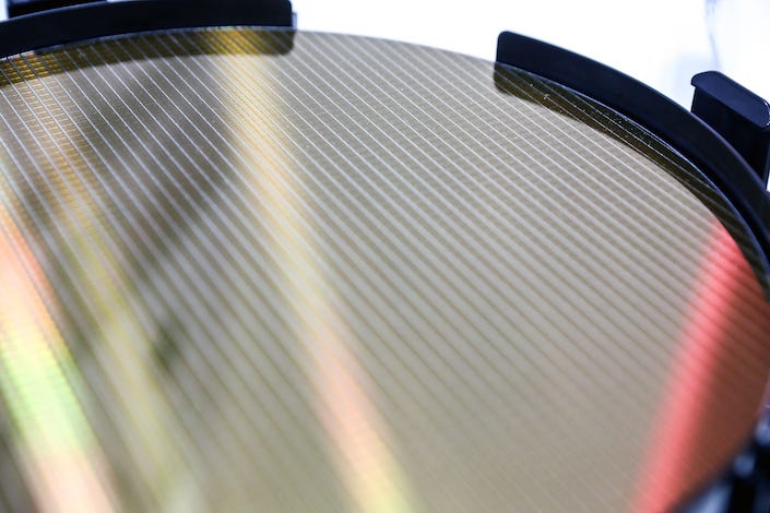 Close-up of a semiconductor wafer. Photo: Bloomberg