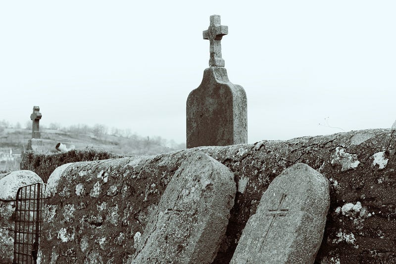 View of gravestones in graveyard