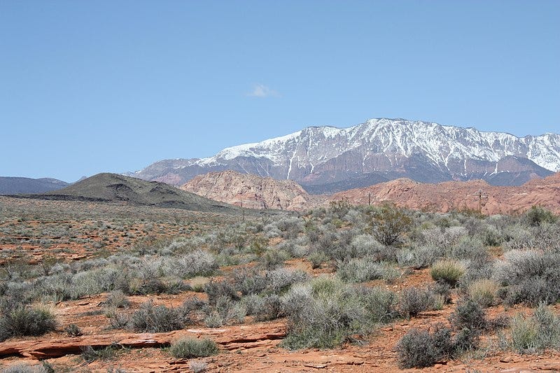File:Pine Valley Mountain (laccolith) and a small cinder cone. Near the boundary of the Navajo Sandstone (Jn) and Kayenta (Jk) Formation (both Jurassic) - panoramio.jpg