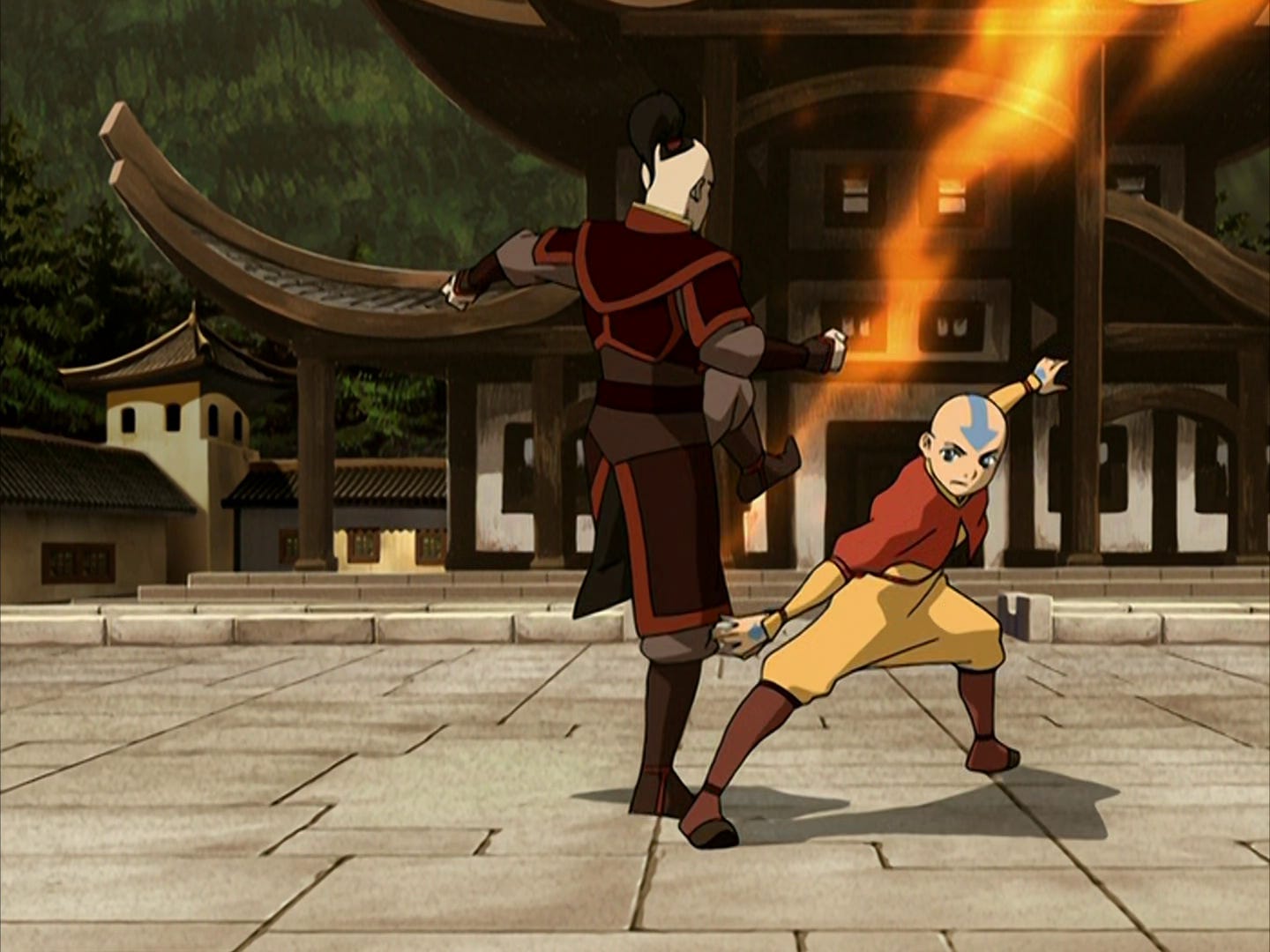 Aang and Zuko are locked in a close exchange. Zuko kicks fire at Aang, while Aang maneuvers around Zuko to avoid it.