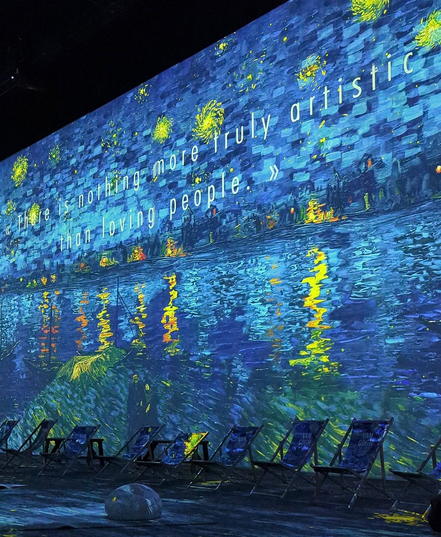 Photo taken at the Van Gogh Exhibit in the room with his art projected onto the walls.