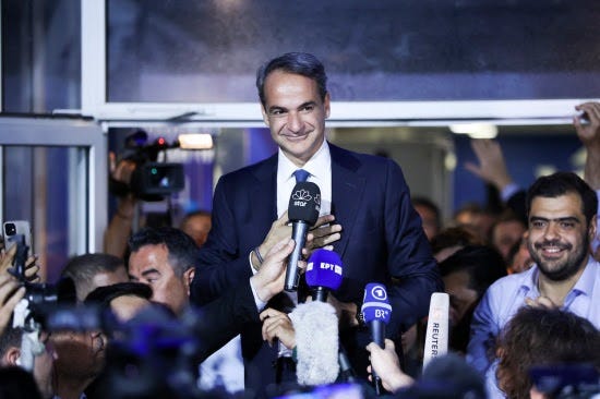 Greek Prime Minister Kyriakos Mitsotakis celebrates his election win.