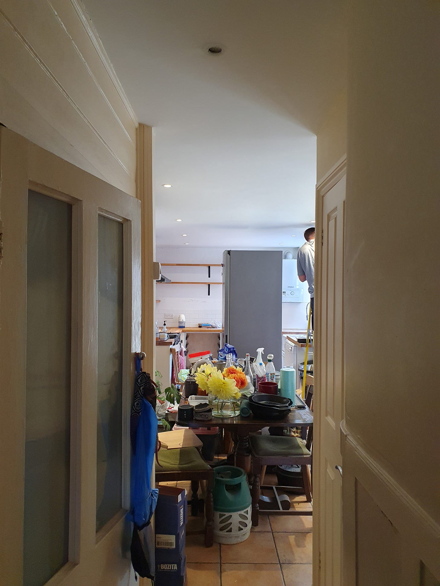 Photo of kitchen covered in mess
