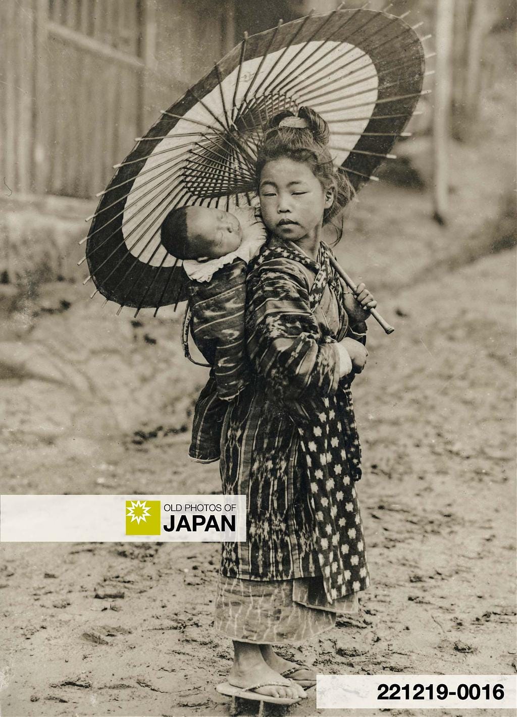 Japanese komori nursemaid with her charge, 1910s