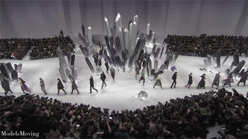 fashion model walking past art