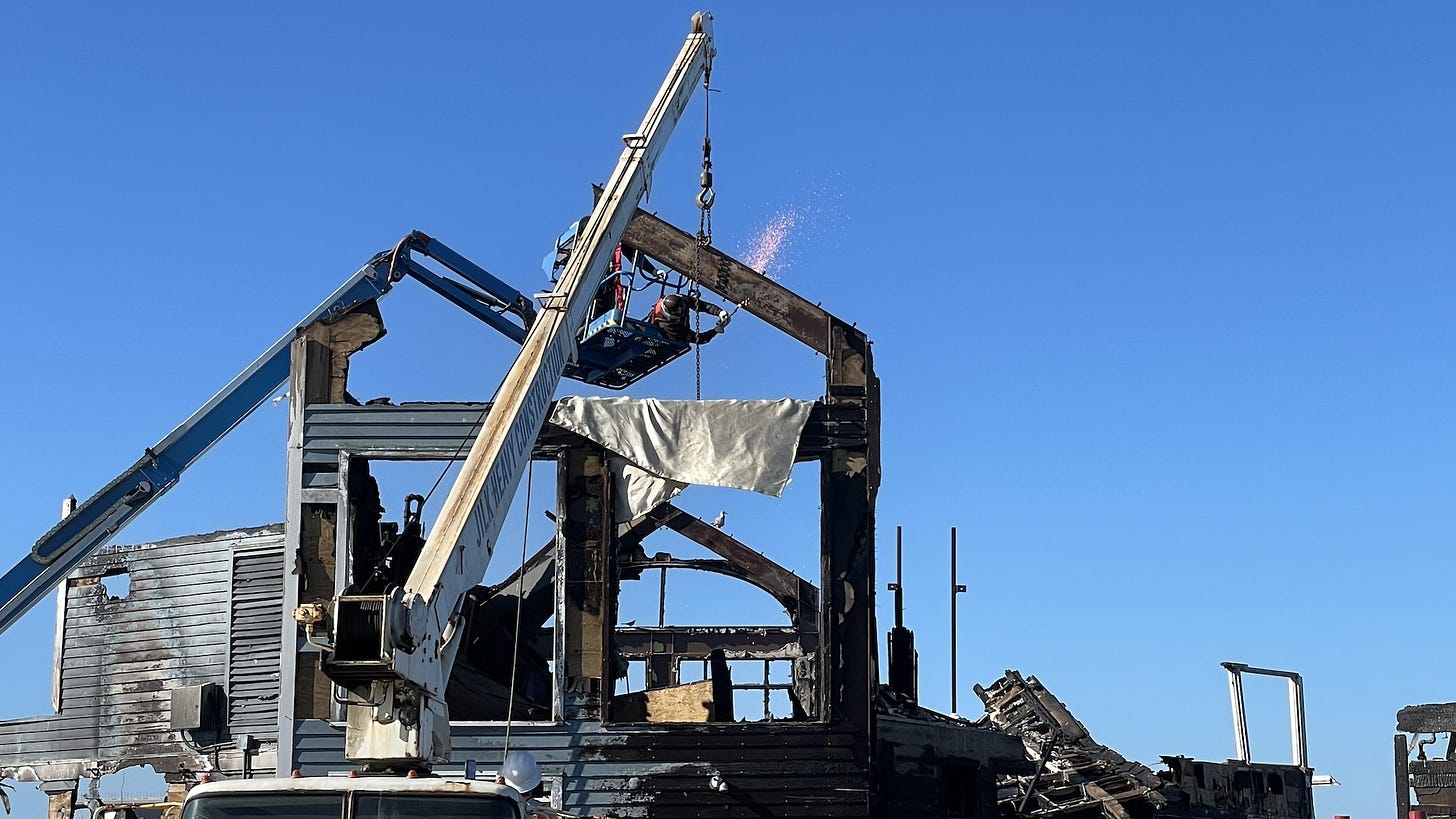 Construction crews have begun removing debris from the Oceanside Pier after a fire destroyed two structures on April 25. Steve Puterski photo