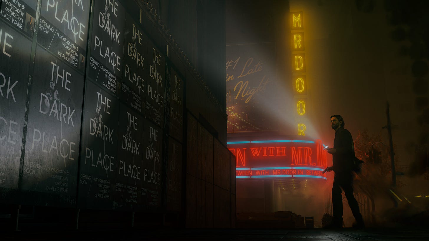 A screenshot of Alan Wake 2, with Alan in the Dark Place pointing his flashlight at posters for THE DARK PLACE: A photography and videography exhibition by Alice Wake, opening soon. An advertisement for the talk show In Between With Mr. Door can be seen lit up neon in the background.