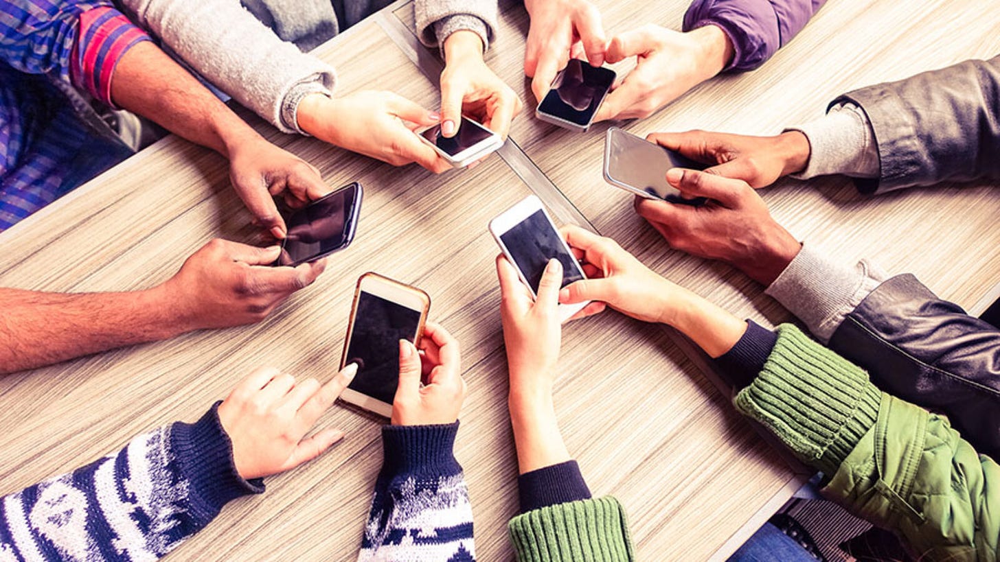 Top view hands circle using phone in cafe -