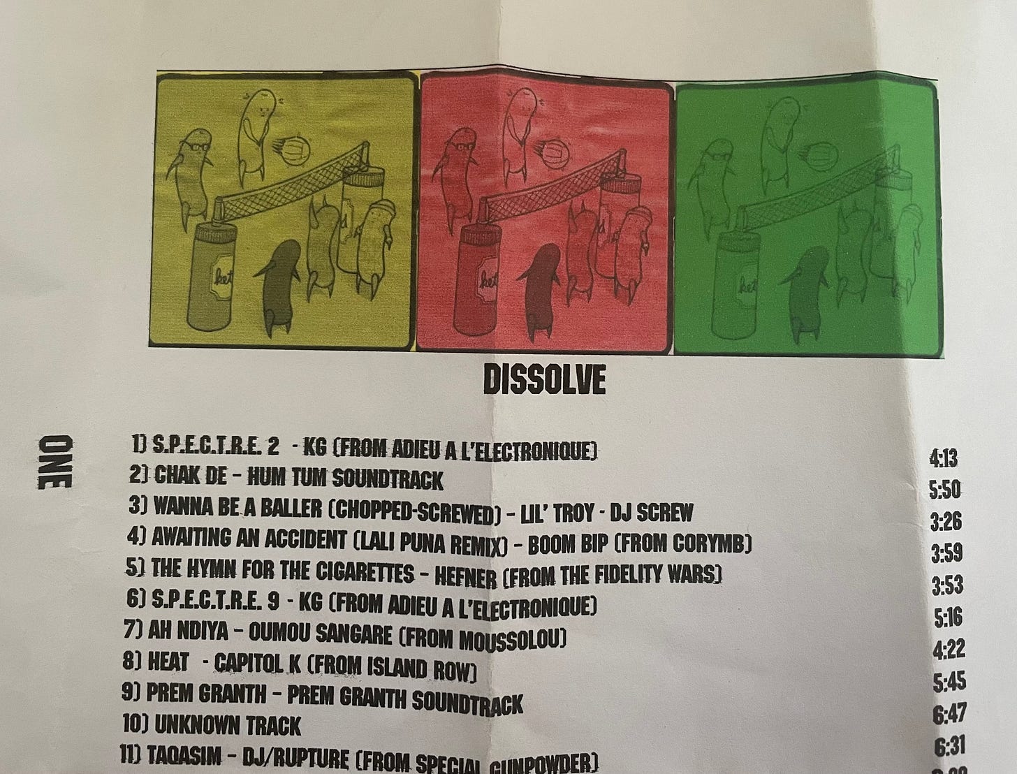 "Dissolve" CD cover with image of hot dogs playing volleyball with track listings