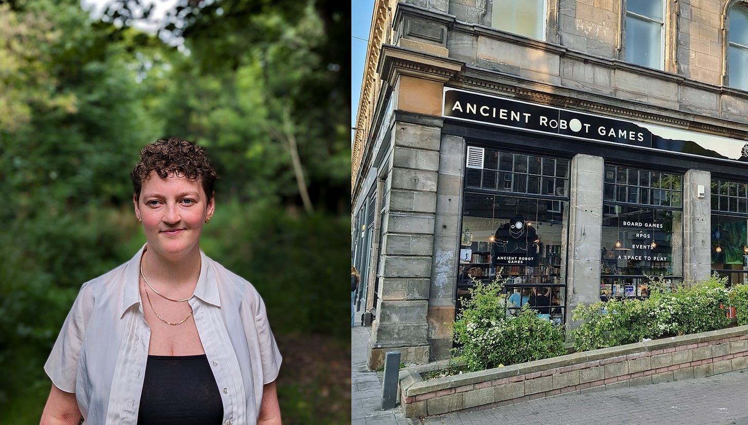 Two photos. The first is portrait of author Jo Reid, a white woman with brown curly hair and a warm smile. She is standing in a forest, and wearing a loose white shit with a gold necklace and gold earrings. The second is of the outside of Ancient Robot Games, a games store with typically scottish stone slab facades and large, well-lit windows.
