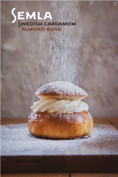 A pastry with powdered sugar on top

Description automatically generated
