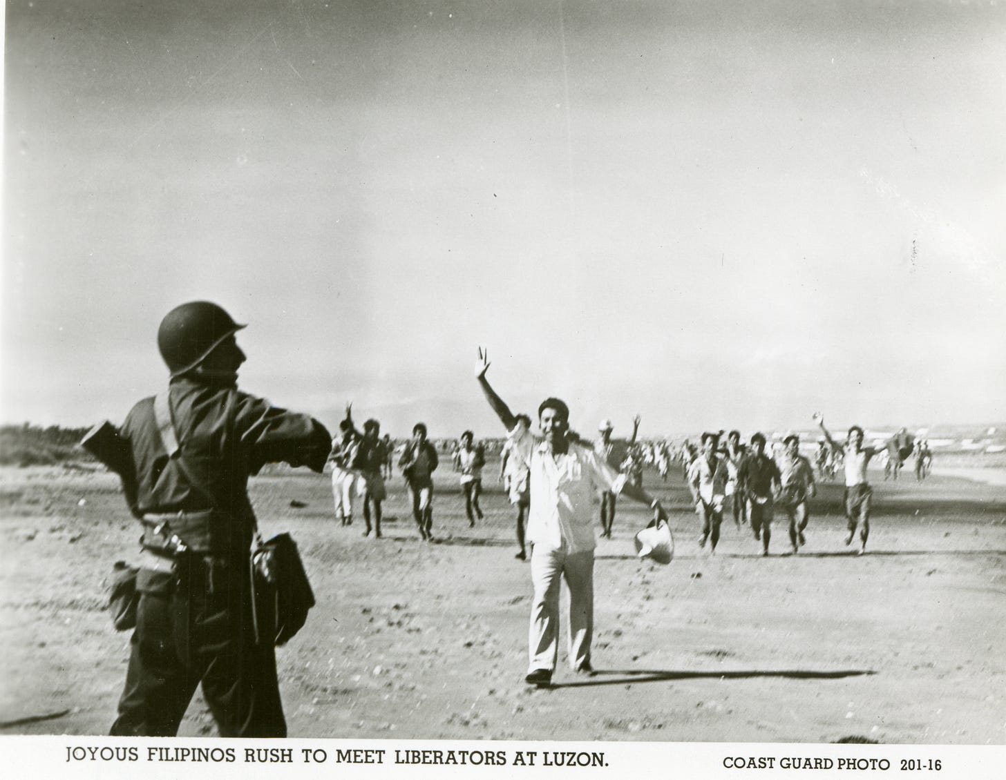 Filipino men greeting American liberators on a beach, Luzon, 1945 | The  Digital Collections of the National WWII Museum : Oral Histories