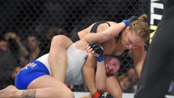 ronda rousey makes history ufc 184 with cat zingano